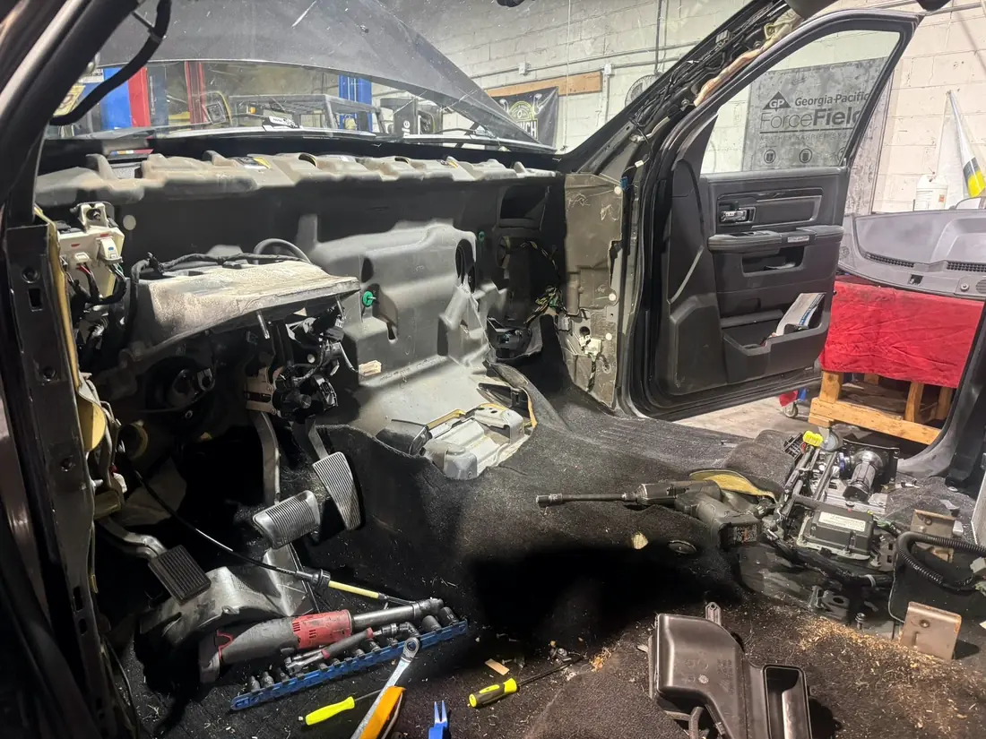 Truck interior with the dashboard removed to reach the heater and A/C box