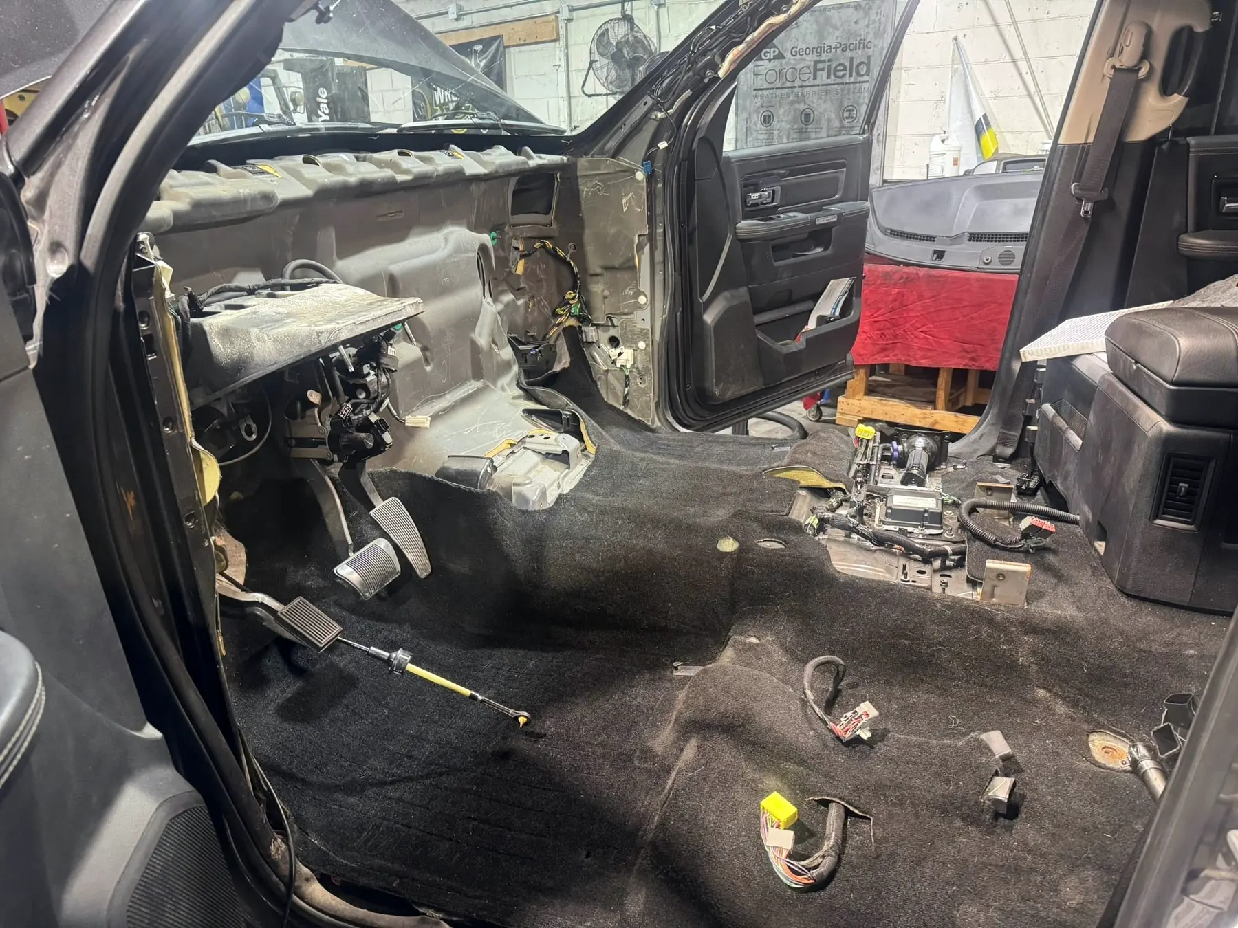 Cab stripped to the floor and firewall during heating and air conditioning work