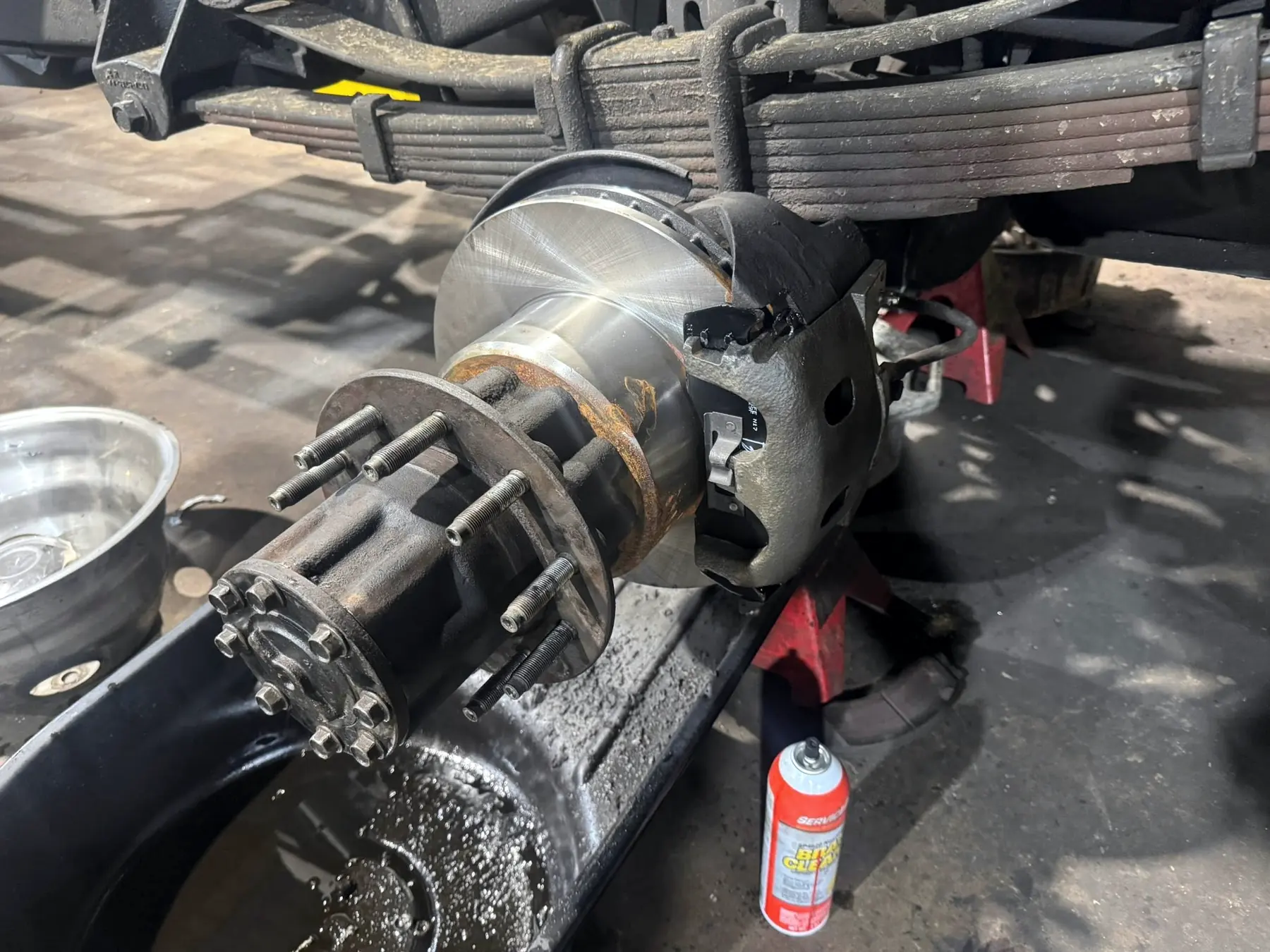 Rear axle shaft and hub pulled out of a dual rear wheel truck