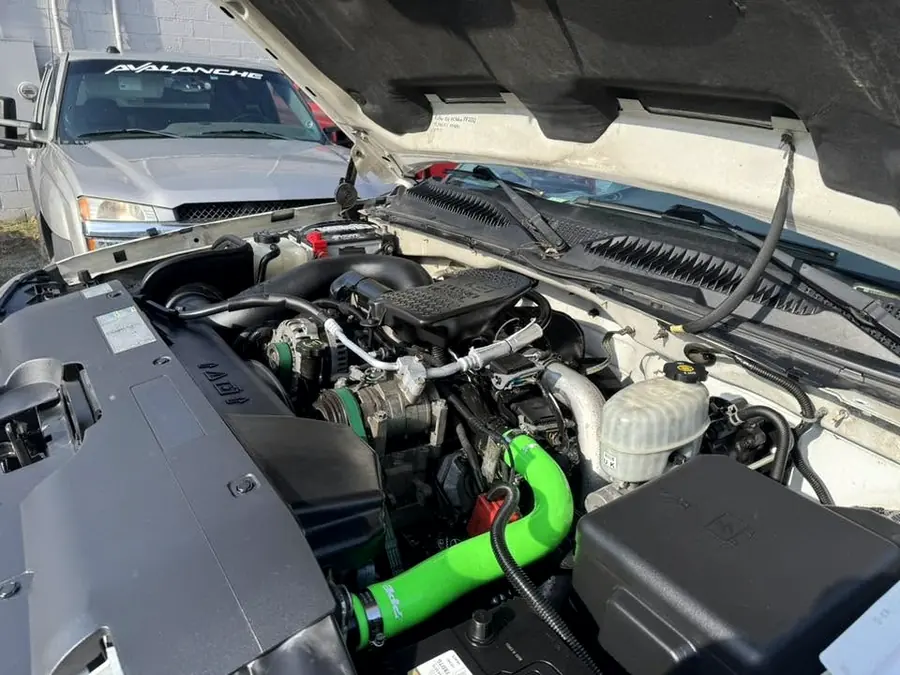 Diesel engine bay fitted with green silicone coolant hoses