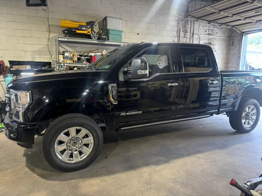 Black Ford Super Duty Platinum in the CBS Diesel shop