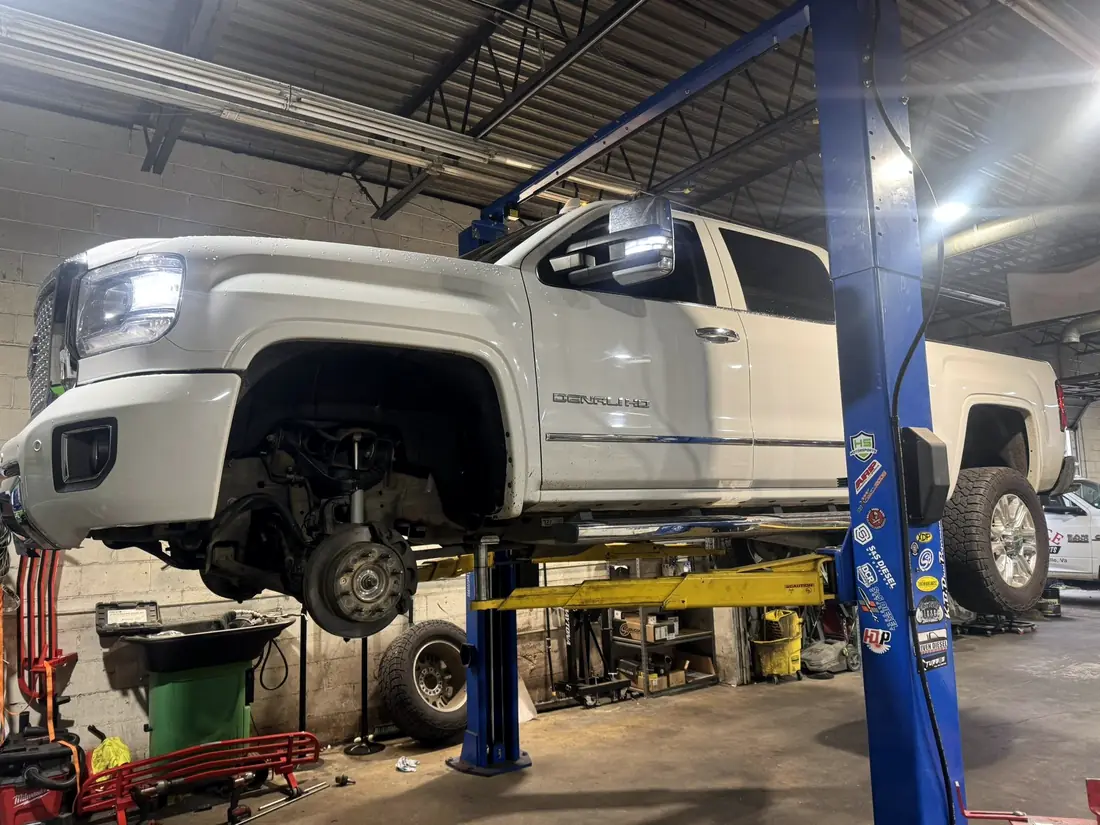 GMC Sierra Denali HD raised on the lift
