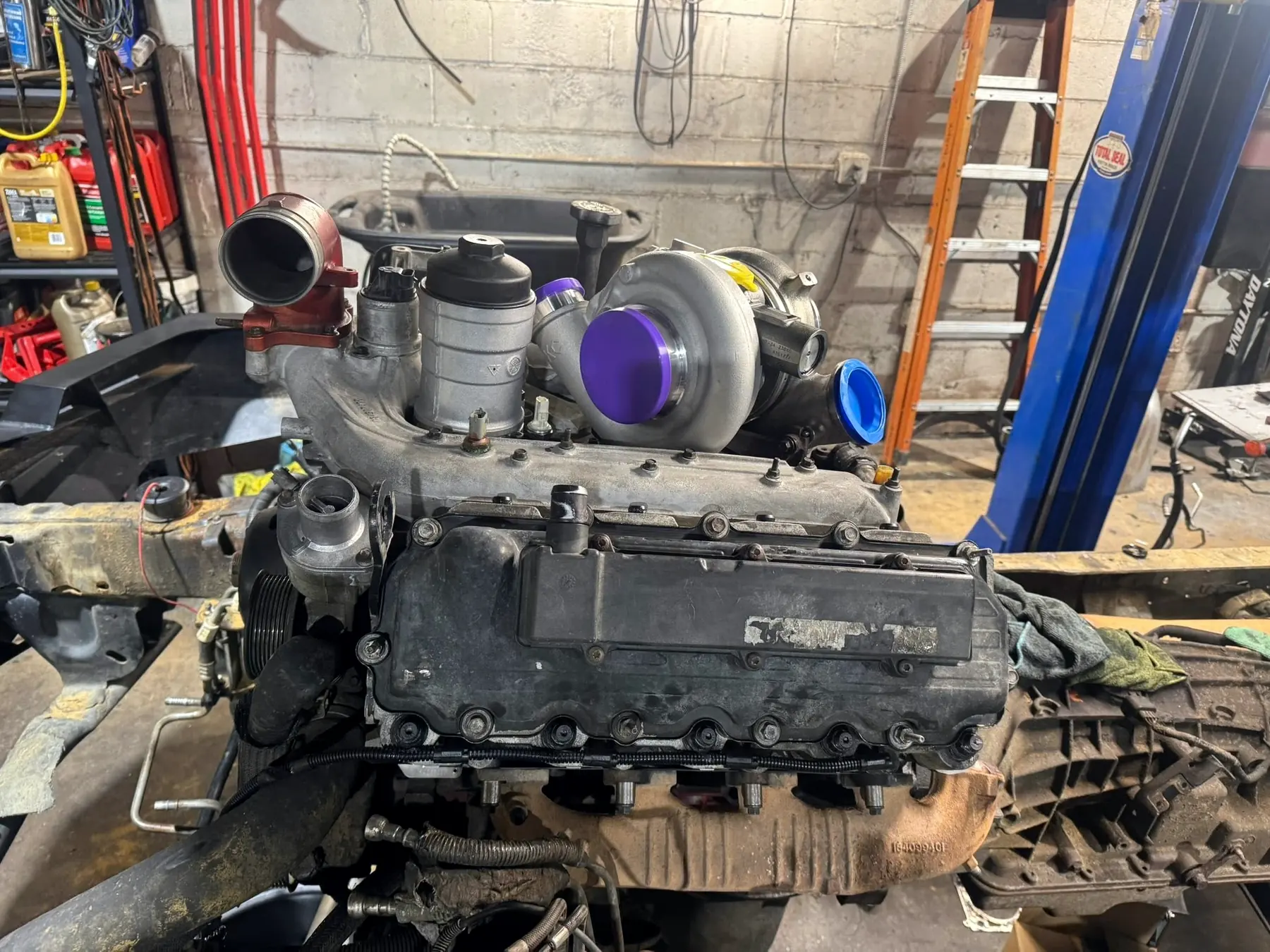 6.0 Power Stroke engine on a stand with the turbocharger fitted
