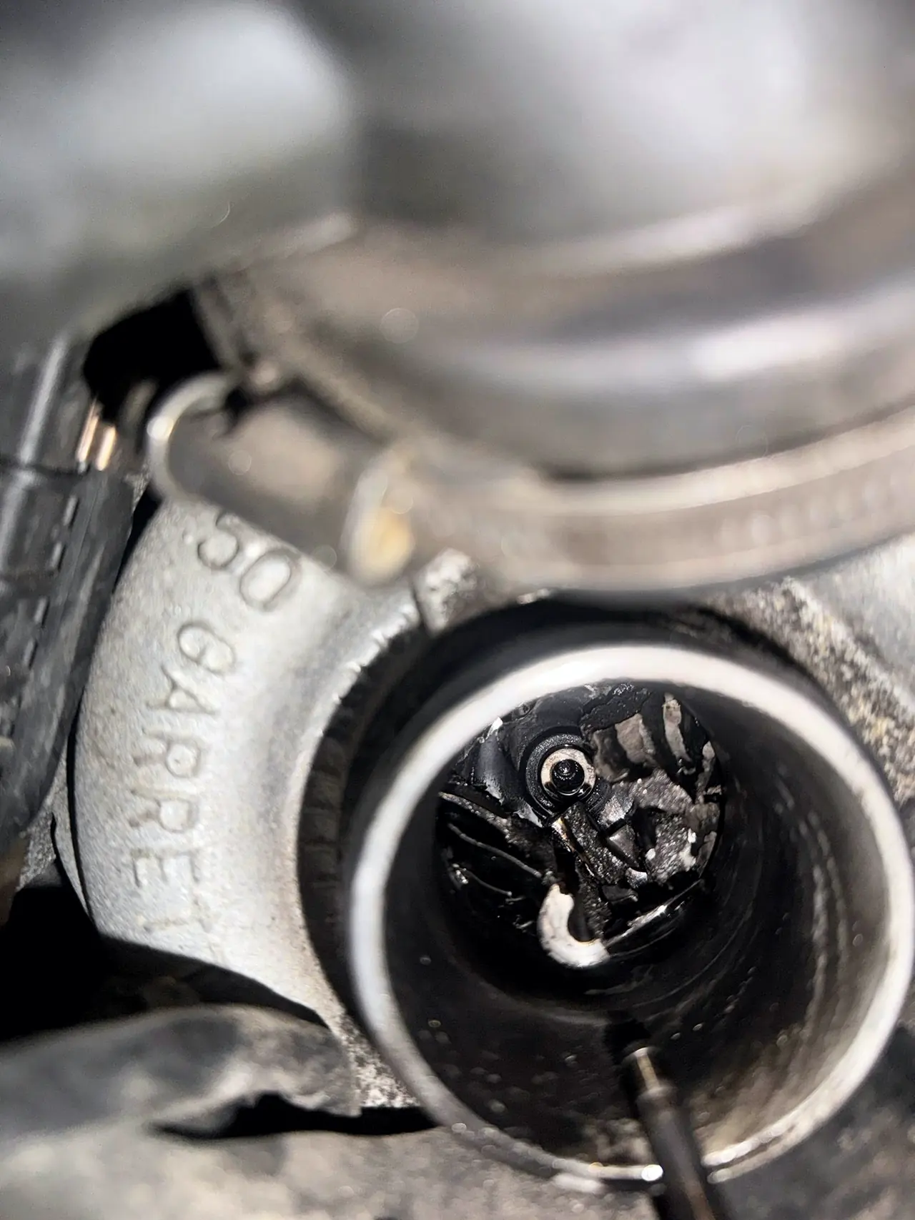 Garrett turbocharger with a destroyed compressor wheel found during diagnosis
