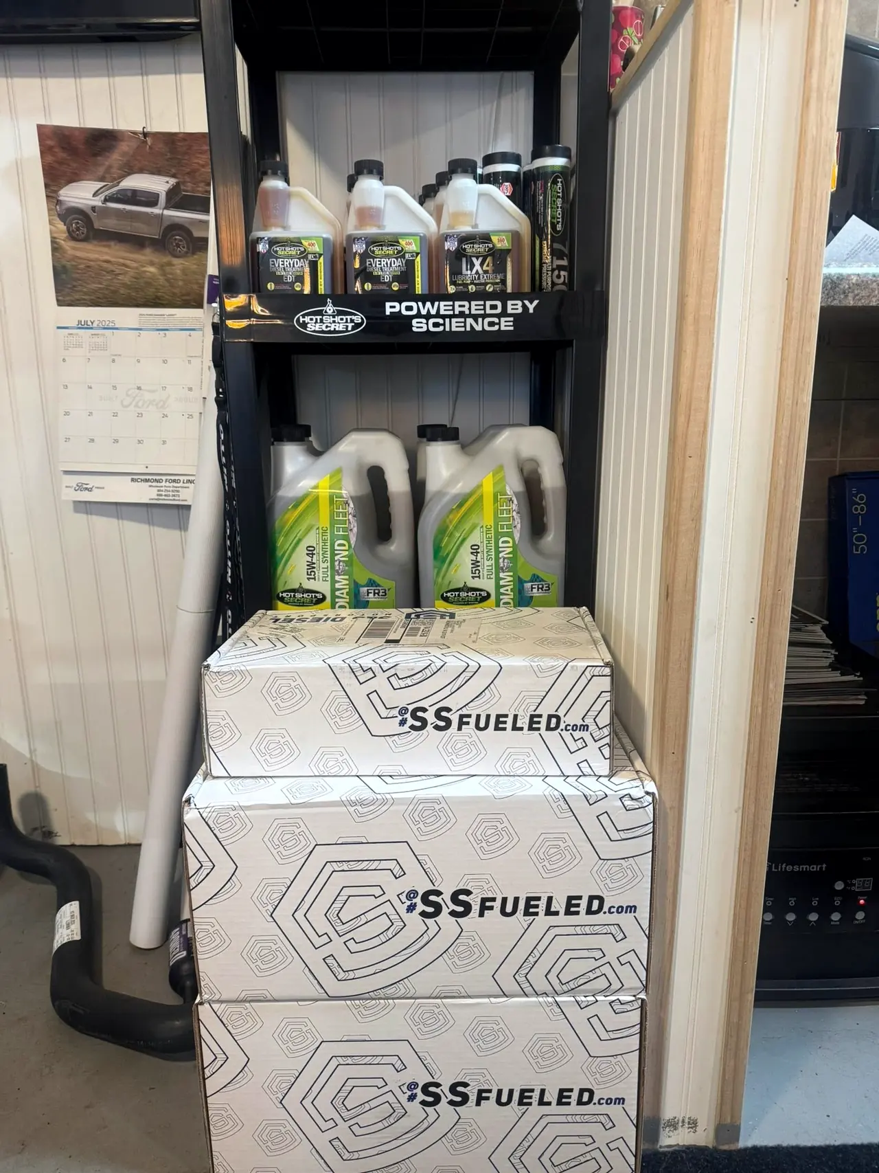 Shelf of Hot Shot's Secret engine oil stocked at CBS Diesel