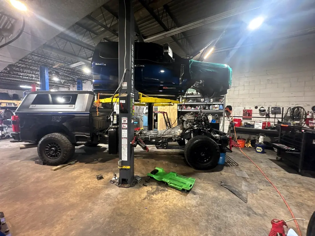 Wide view of the CBS Diesel workshop with several trucks in the bays