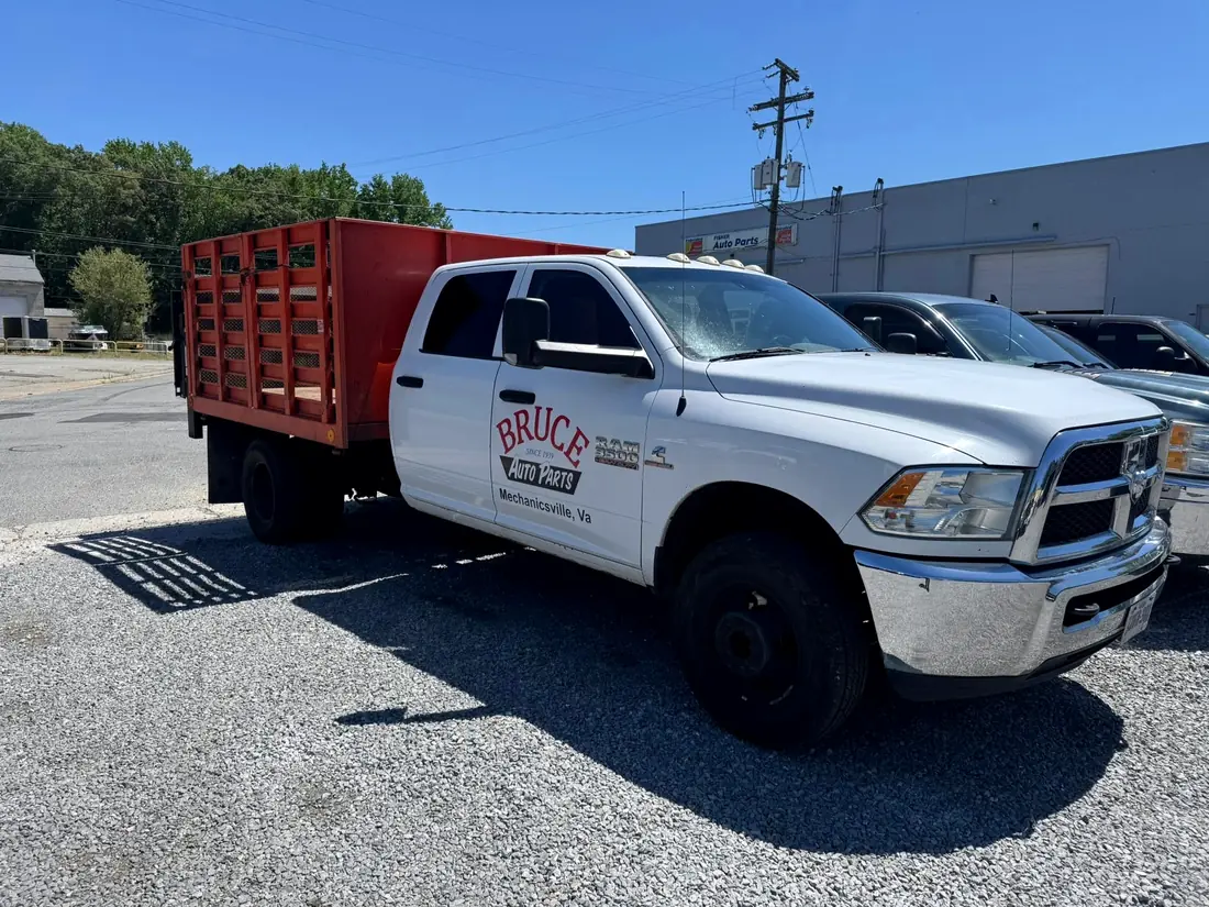 Bruce Auto Parts stake-body Ram 3500 fleet truck