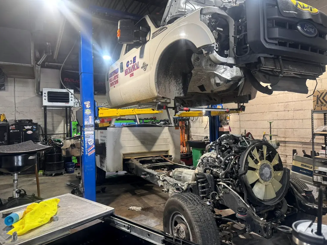 Cab-off Ford with the engine and cooling fan exposed