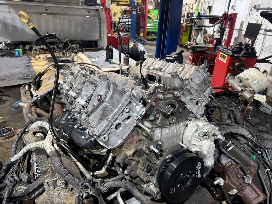 Duramax engine out of the truck on the shop floor