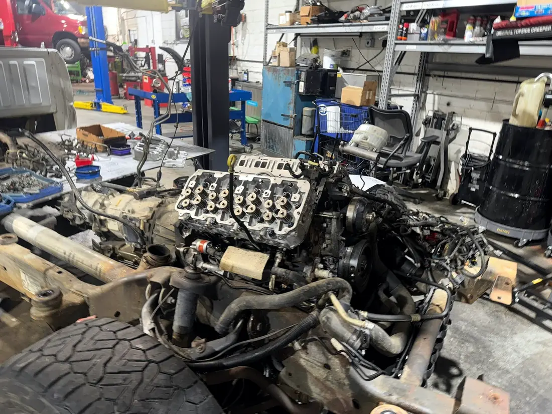 Duramax engine on the floor with the valve covers off