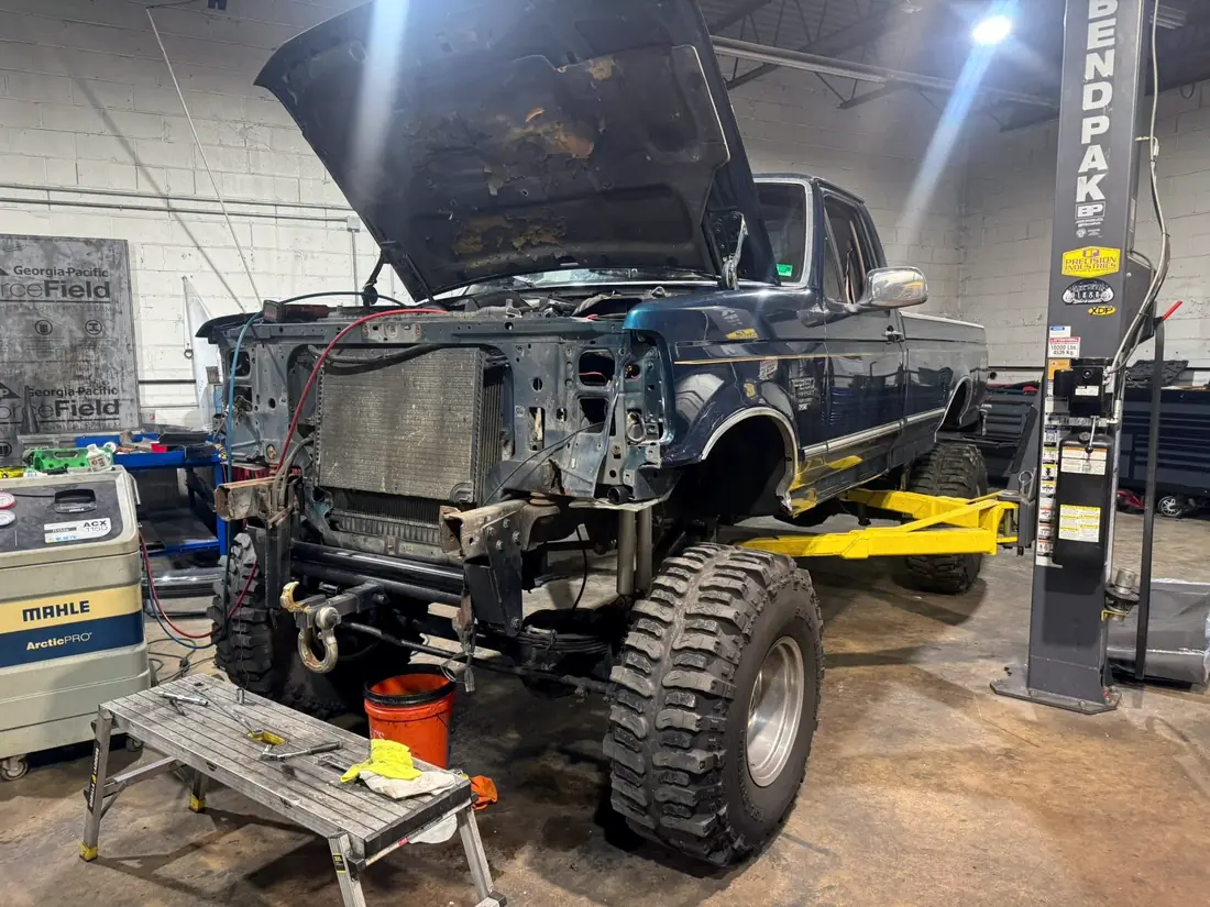 OBS Ford F-series stripped to the firewall on the lift