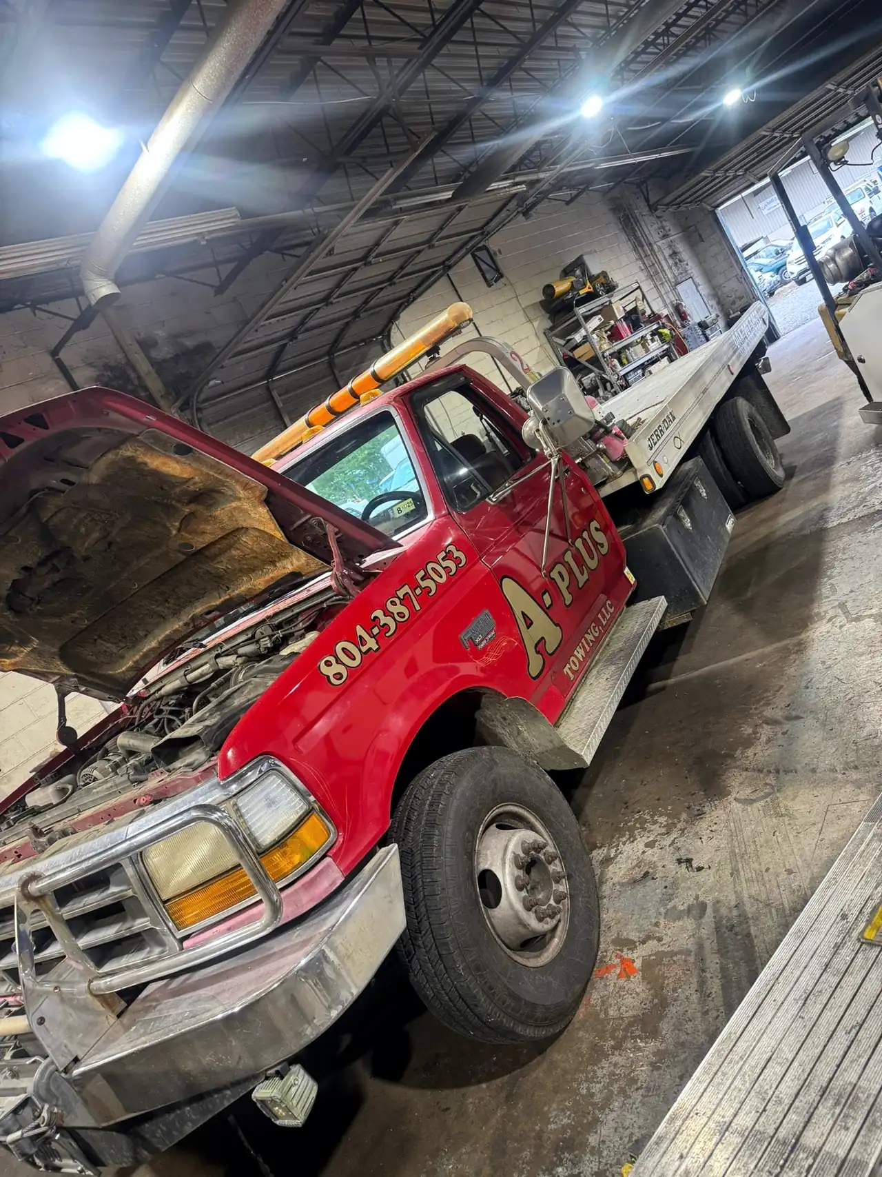 A-Plus Towing wrecker in the CBS Diesel bay