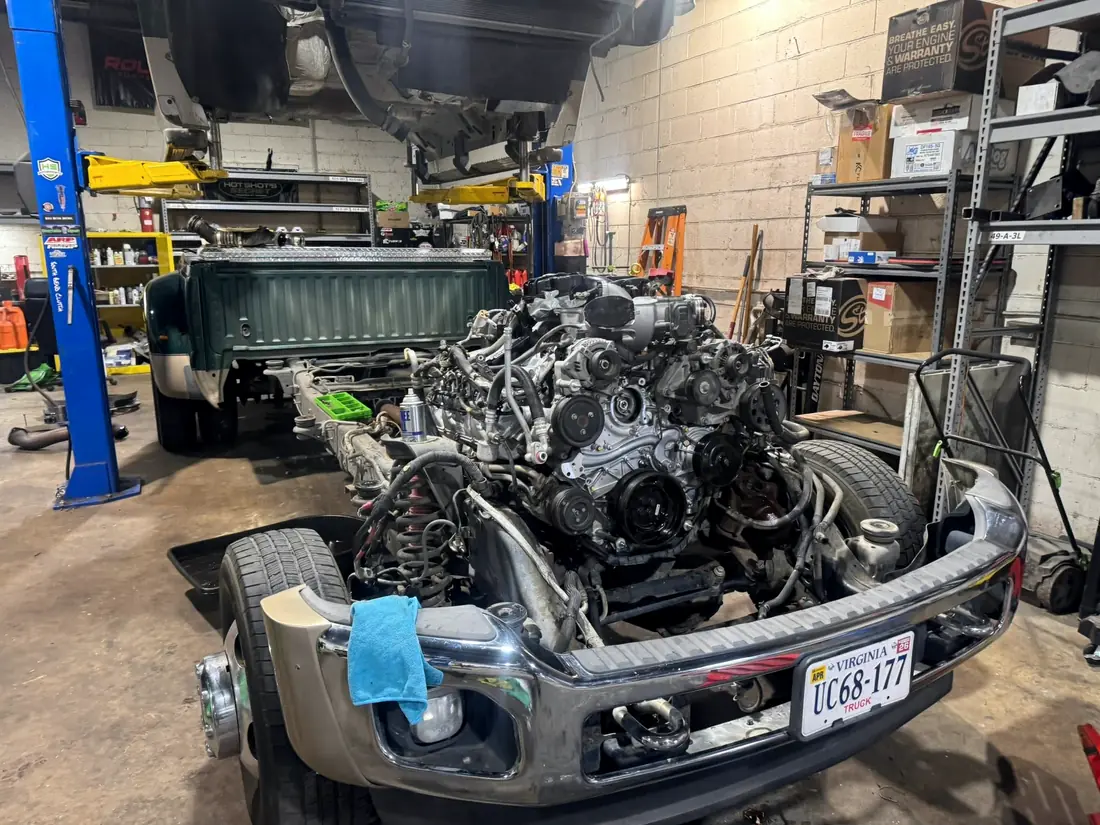 Diesel engine on a cart in front of a cab-off truck