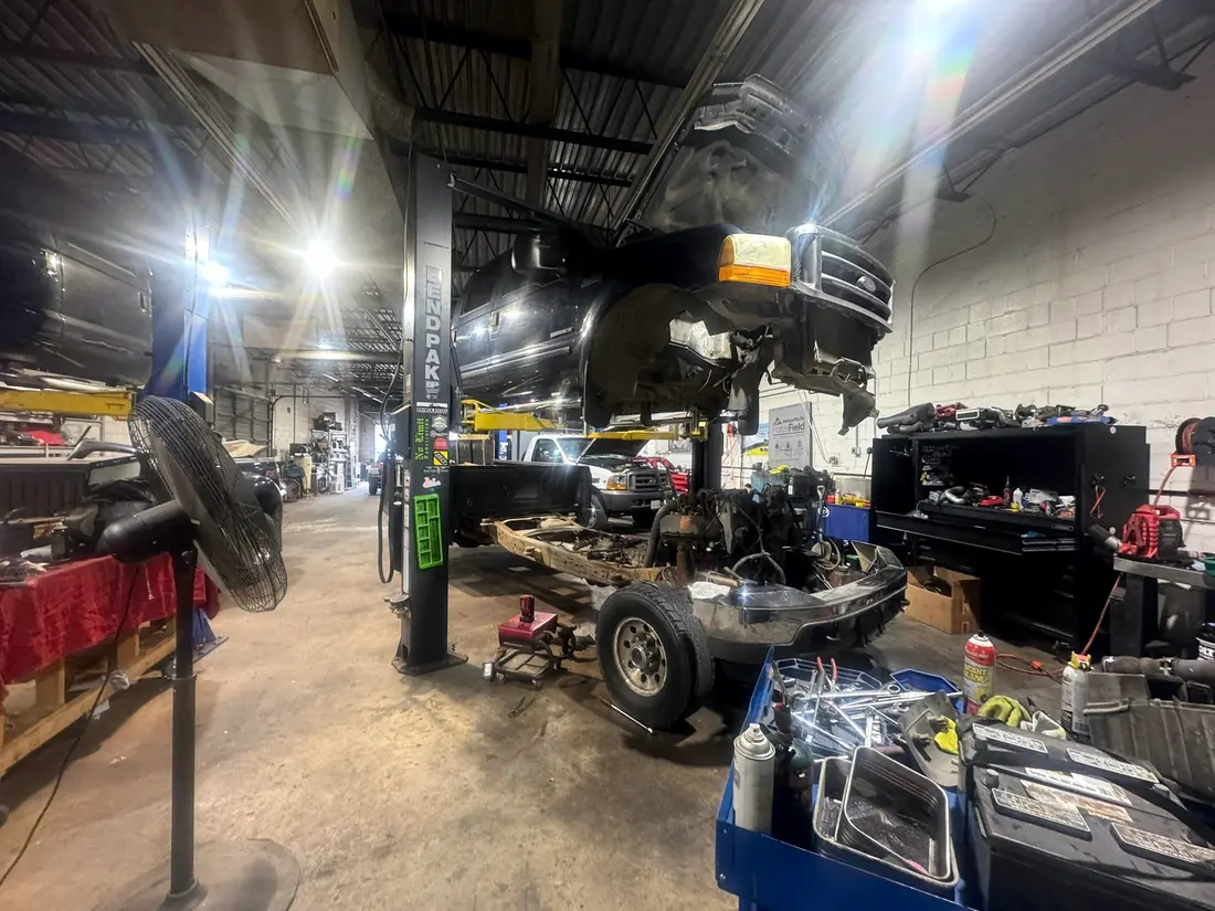 Stripped chassis on the lift at CBS Diesel